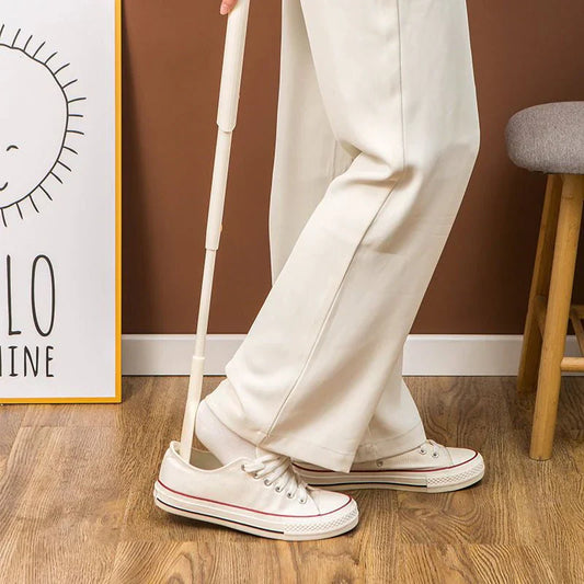 Un Chausse - Pied Télescopique pour un Enfilage Facile